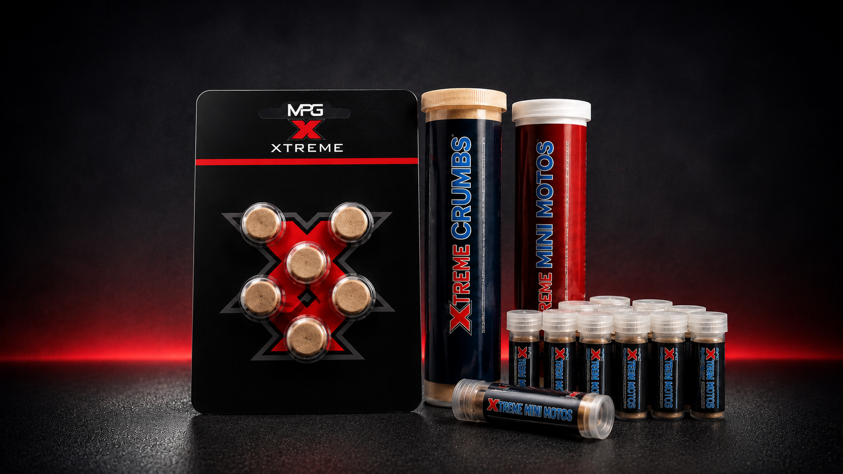 MPG X-Caps, Xtreme Crumbs, and Xtreme Mini Motos fuel products on a dark studio background